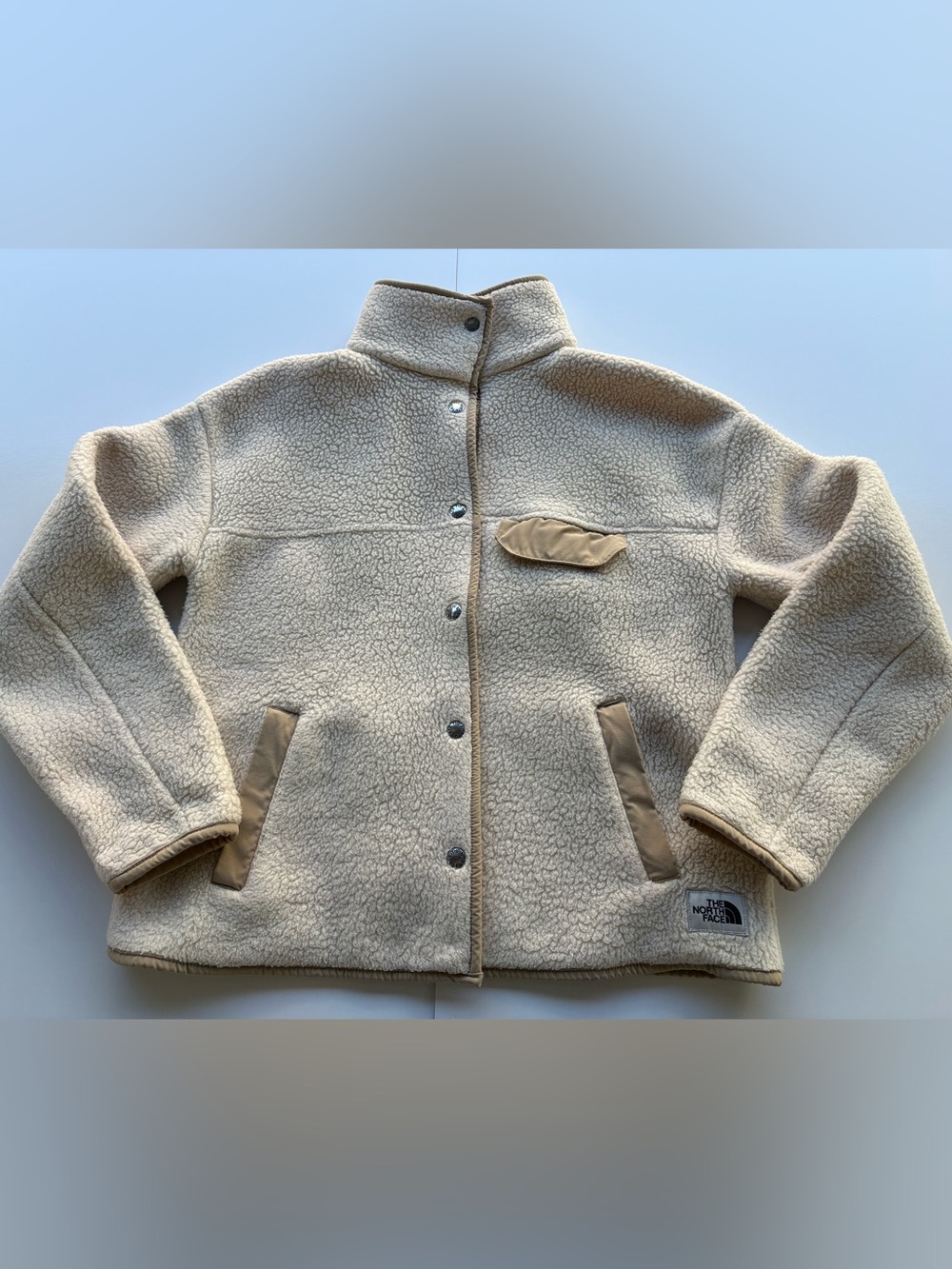 The North Face woman’s Cream Sherpa Puffer Jacket size XS